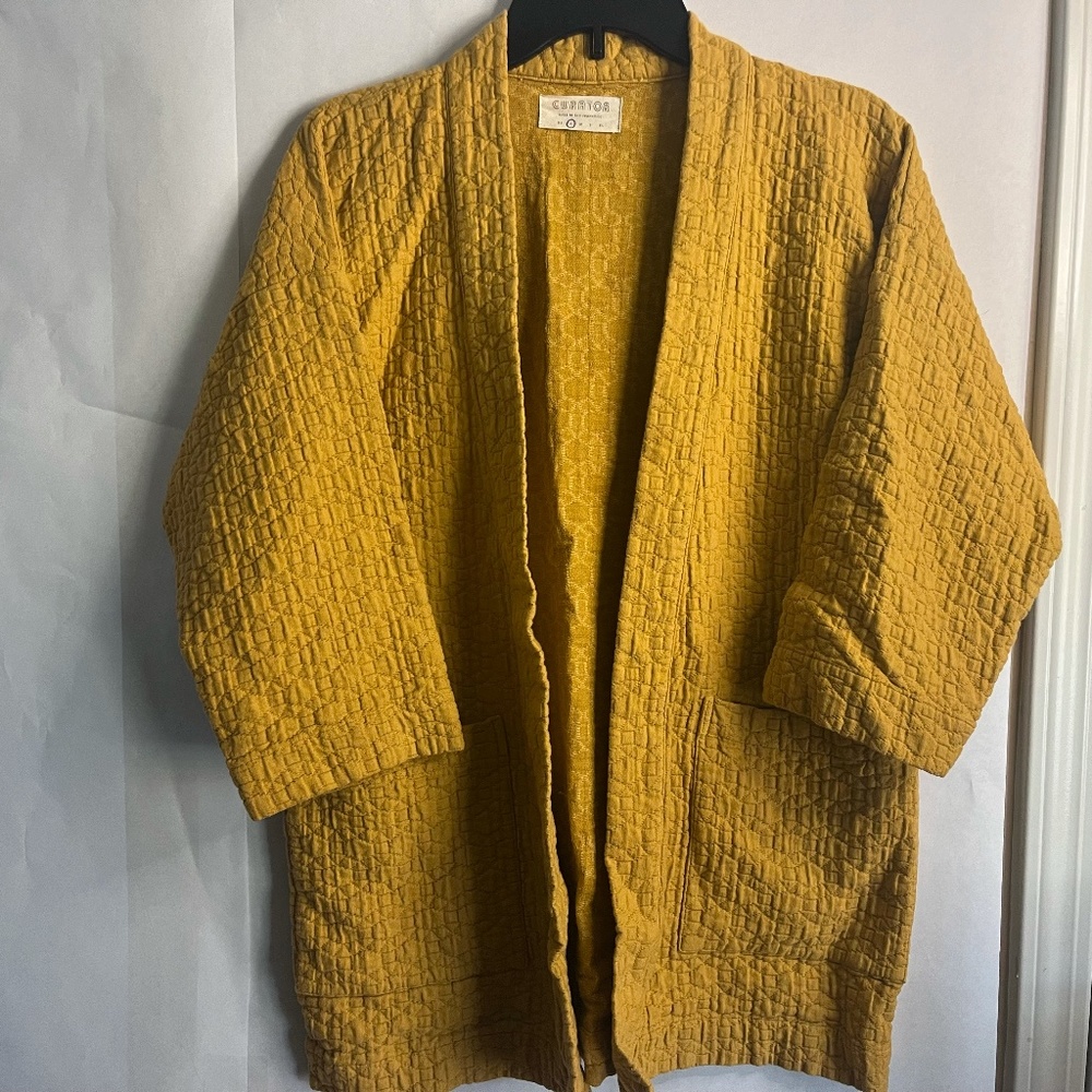 Curator Jules Cartigan Limited Mustard Color Waffle Quilted Pattern